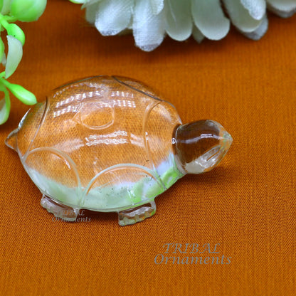 Natural sphatik crystal turtle statue by Tribal Ornaments, symbolizing wealth and prosperity, detailed carved divine tortoise figure.