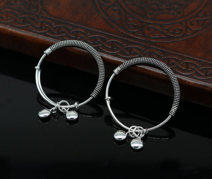 Sterling silver adjustable baby bangle with charms, stylish oxidized jewelry suitable for newborns and kids, by TRIBAL ORNAMENTS.