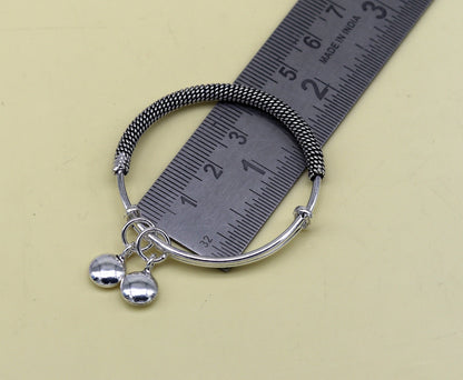 Sterling silver adjustable baby bangle with charms, tribal ornaments design, perfect for newborn kids jewelry and pretty gift.