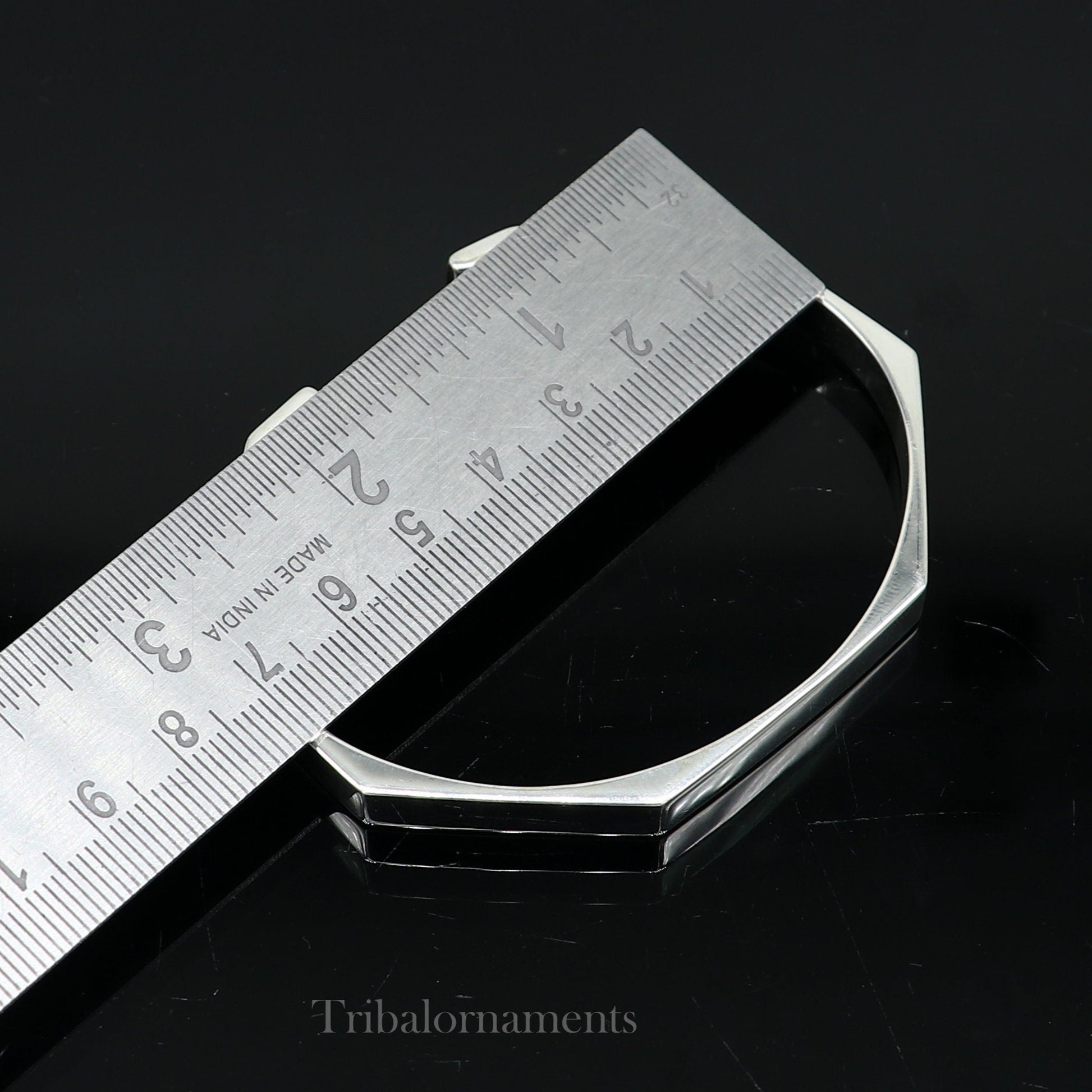 Plain shiny 925 sterling silver adjustable cuff bangle bracelet by Tribal Ornaments, unisex jewelry with a sleek, polished finish.