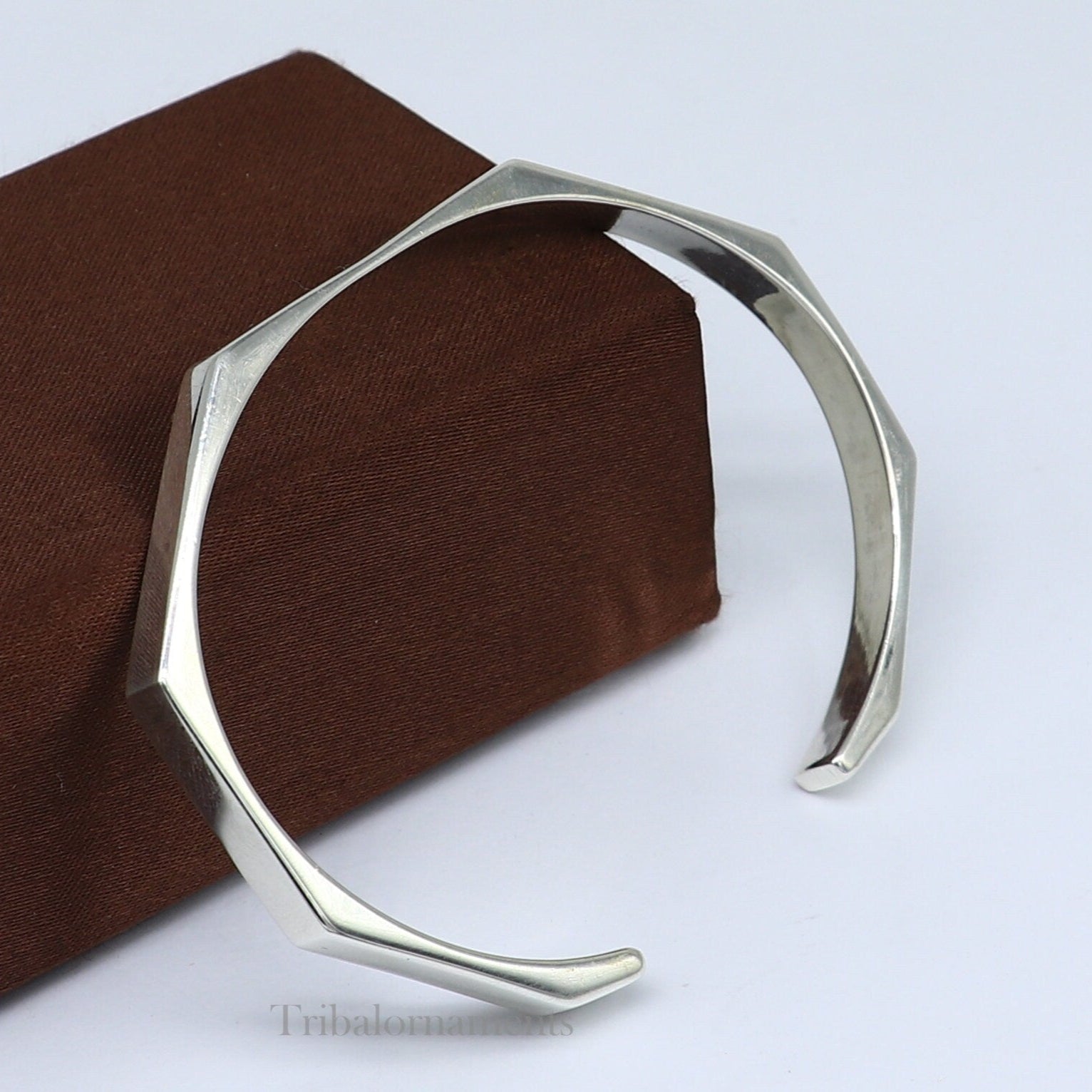 Shiny plain 925 sterling silver adjustable cuff bangle bracelet by TRIBAL ORNAMENTS, unisex jewelry with a sleek, polished finish.