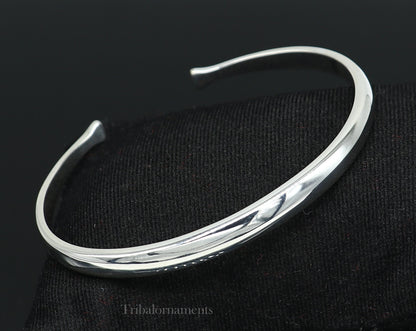 Shiny solid 925 sterling silver adjustable cuff bangle bracelet by Tribal Ornaments, unisex jewelry, handcrafted and stylish.