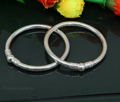 Shiny sterling silver stylish bangle bracelet from Tribal Ornaments, featuring a sleek design perfect for gifting or brides.