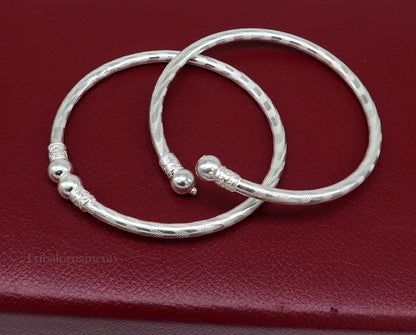 Sterling silver handmade bangle bracelet with plain white design, unisex tribal ornament jewelry, perfect as a customized gift.