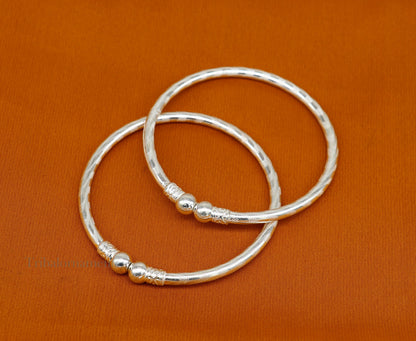 Sterling silver handmade bangle bracelet with plain white design, unisex tribal ornament jewelry, custom stylish kada for gifting.