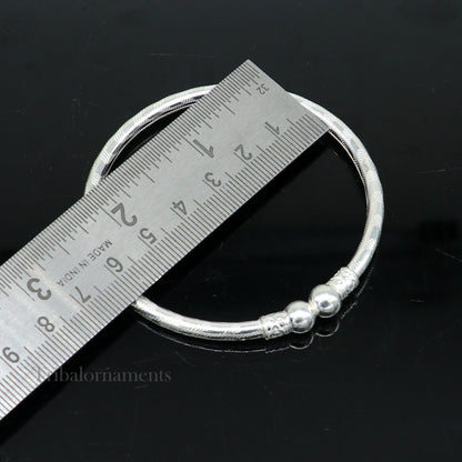 Sterling silver handmade bangle bracelet with plain white design, unisex tribal ornament jewelry, customizable kada for gifting.