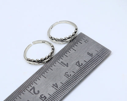Sterling silver small toe ring with customized tribal design, handmade bridal jewelry from TRIBAL ORNAMENTS, India.