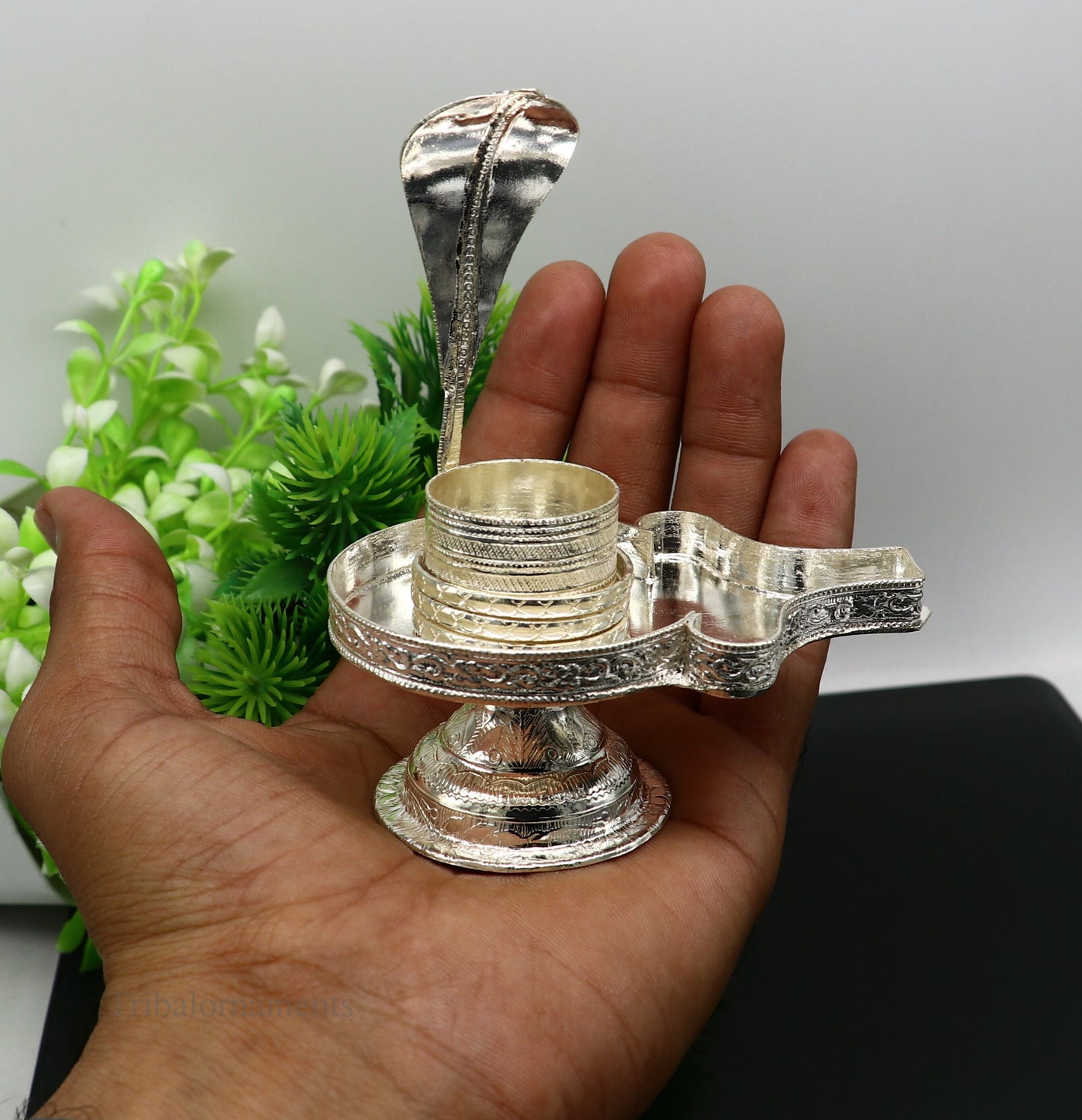 Pure 925 sterling silver Lord Shiva Lingam stand in a traditional design, suitable for holding Shiva Lingam in a home temple.
