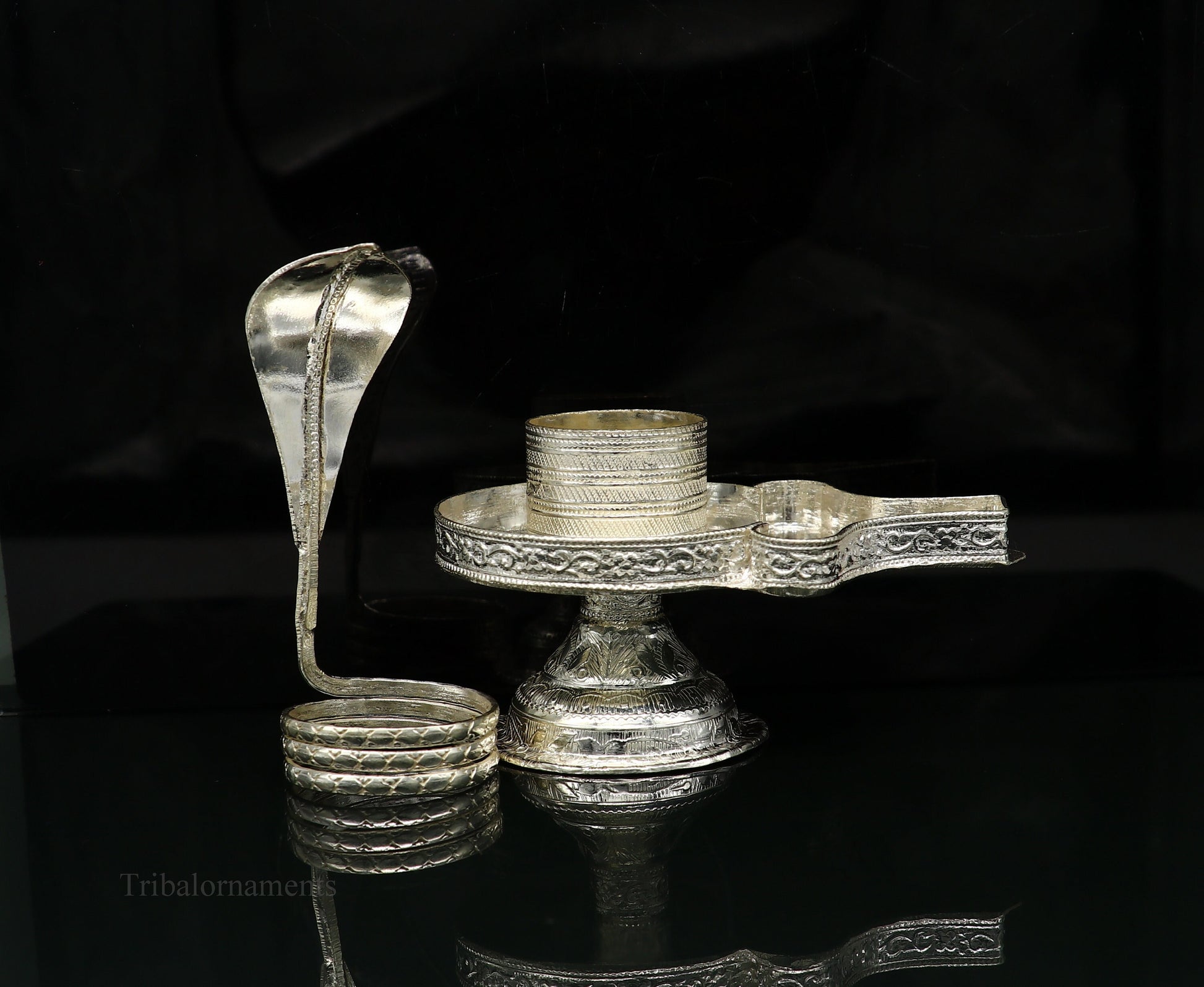 Pure 925 sterling silver Lord Shiva Lingam stand with intricate design, ideal for holding Shiva Lingam in home temple puja.