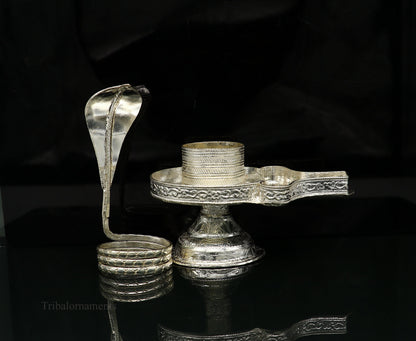 Pure 925 sterling silver Lord Shiva Lingam stand with intricate design, ideal for holding Shiva Lingam in home temple puja.