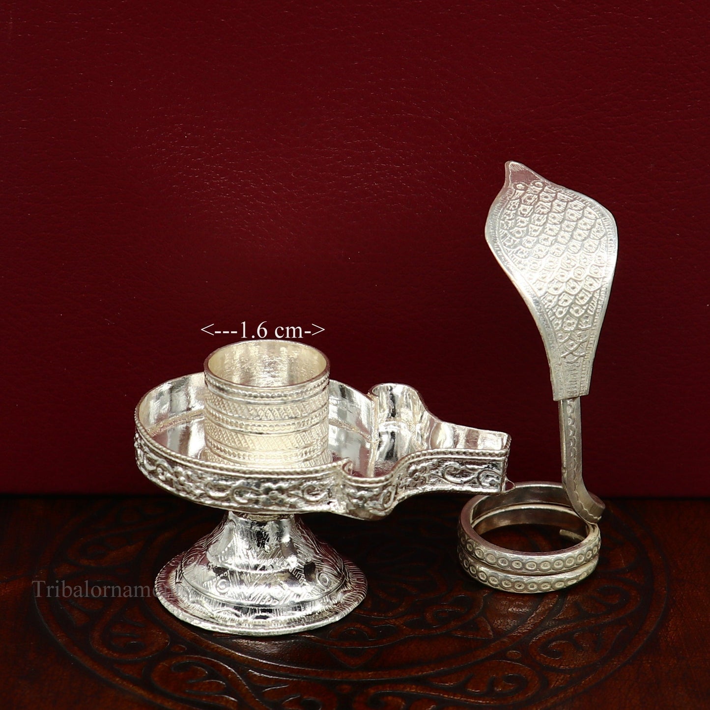Sterling silver Lord Shiva Lingam stand from Tribal Ornaments, designed to hold Shiva Lingam in home temple for puja rituals.