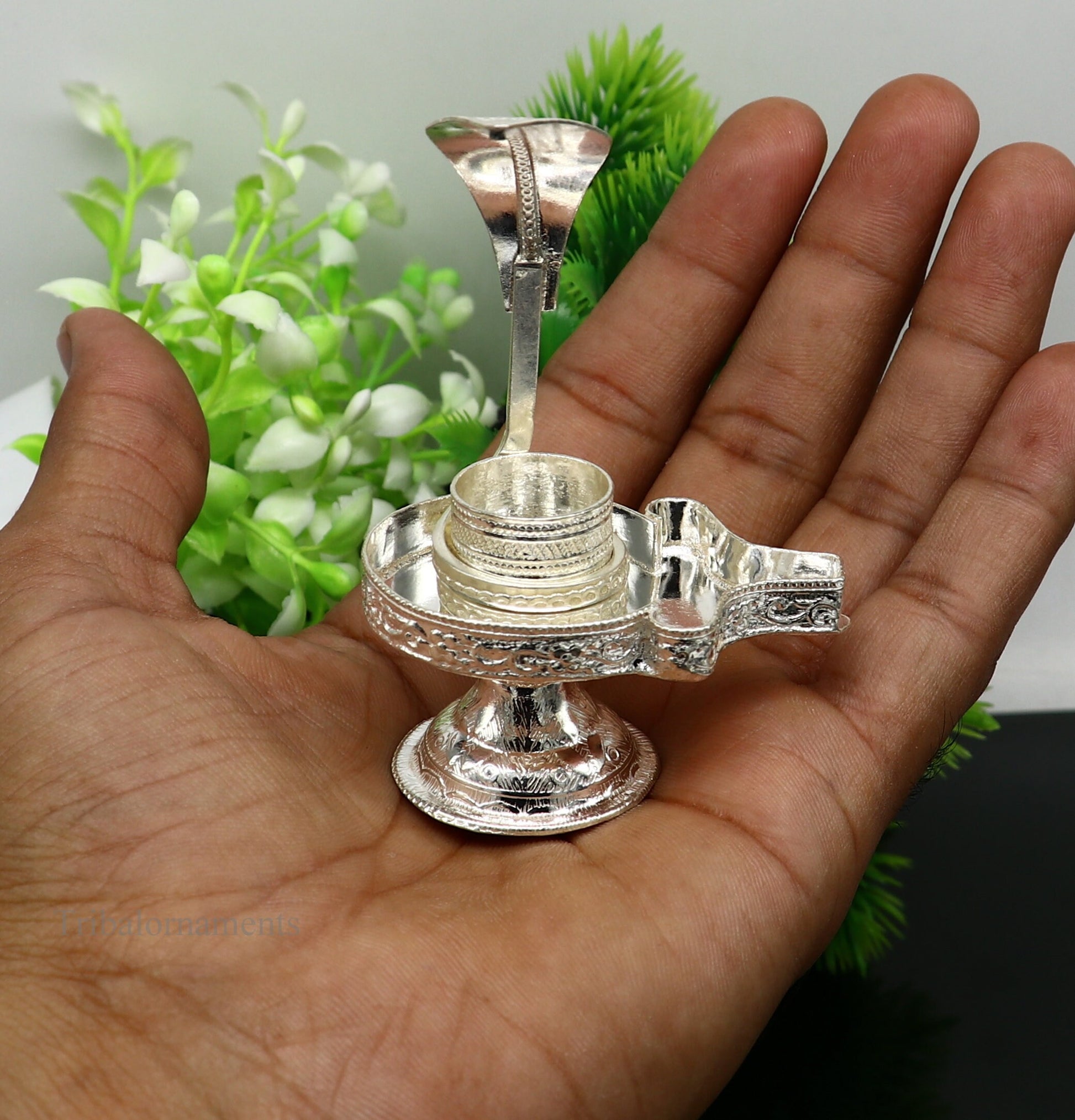 Pure 925 sterling silver Lord Shiva Lingam stand with intricate design, ideal for holding Shiva Lingam in home temple puja.