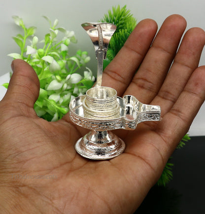 Pure 925 sterling silver Lord Shiva Lingam stand with intricate design, ideal for holding Shiva Lingam in home temple puja.
