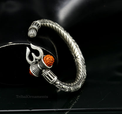 Sterling silver Shiva trident bangle bracelet with intricate Nakshi work, designed for men, from TRIBAL ORNAMENTS.