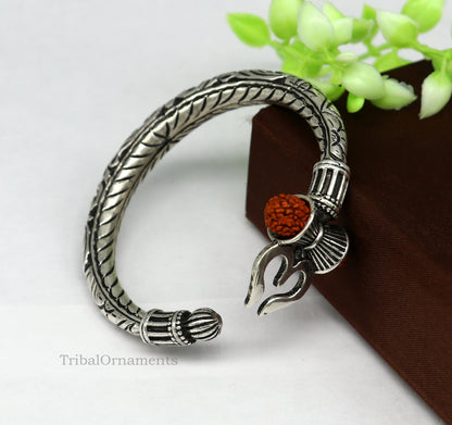 Sterling silver Shiva trident bangle bracelet with intricate Nakshi work, designed for men, from TRIBAL ORNAMENTS.