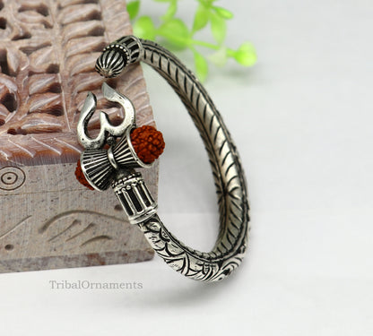 Sterling silver Shiva trident bangle bracelet with intricate Nakshi work, handcrafted men's jewelry from TRIBAL ORNAMENTS India.