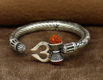 Sterling silver Shiva trident bangle bracelet with intricate Nakshi work, men's jewelry from TRIBAL ORNAMENTS, Indian craftsmanship