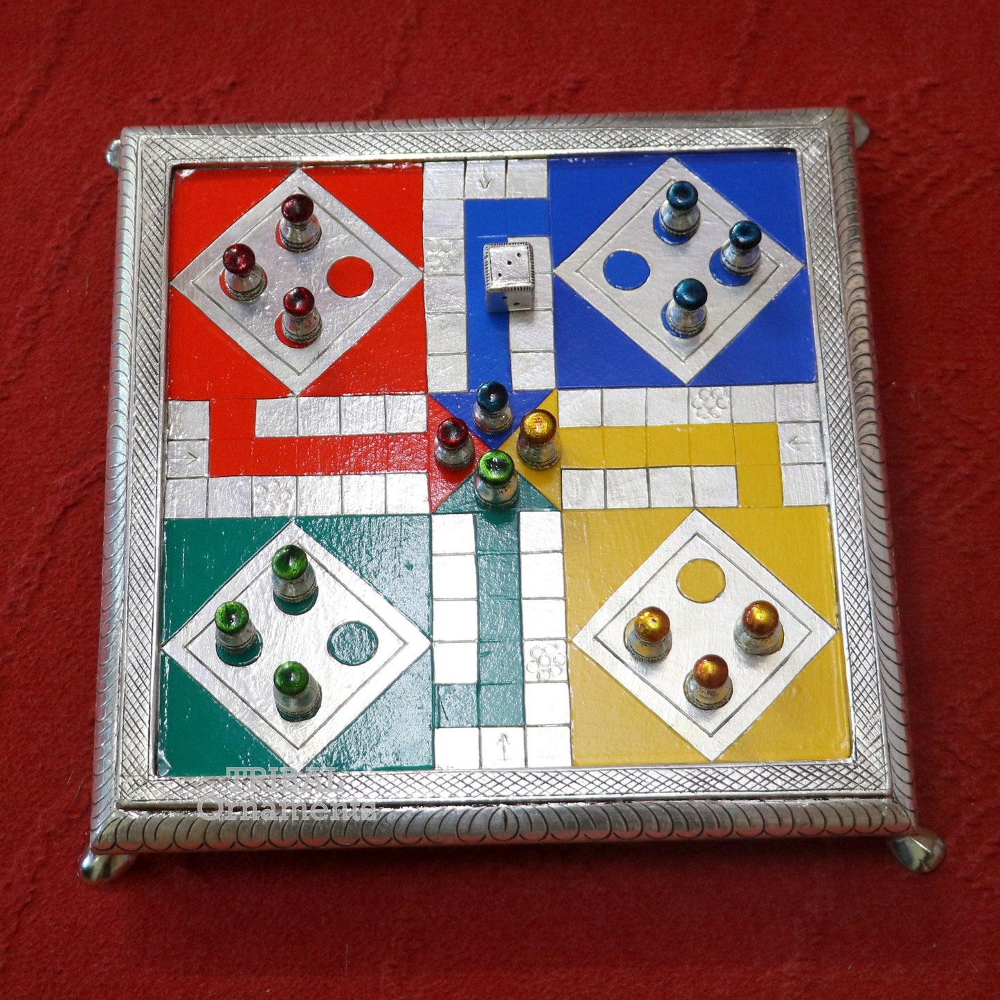 Pure 925 sterling silver handcrafted LUDO game board with intricate design on wooden base, a regal silver gift by Tribal Ornaments.