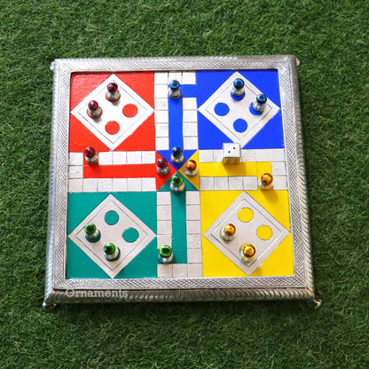 Handcrafted sterling silver LUDO game board on wooden base with intricate tribal design by TRIBAL ORNAMENTS.