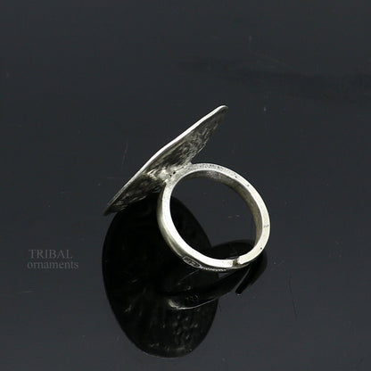 Sterling silver handmade flower-shaped adjustable ring by TRIBAL ORNAMENTS, tribal ethnic jewelry for men and women.