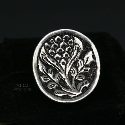 Sterling silver handmade flower-shaped adjustable ring by TRIBAL ORNAMENTS, unisex tribal ethnic jewelry with intricate chitai work.