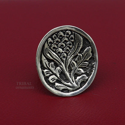 Sterling silver handmade flower-shaped adjustable ring by TRIBAL ORNAMENTS, unisex tribal ethnic jewelry with chitai work design.