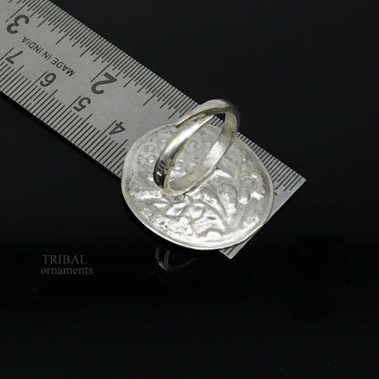 Sterling silver handmade flower-shaped adjustable ring by TRIBAL ORNAMENTS featuring tribal ethnic jewelry style.