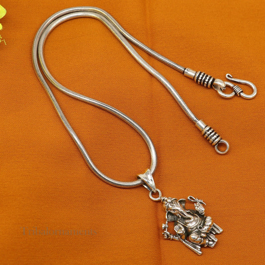 Handmade 925 sterling silver Ganesha pendant by TRIBAL ORNAMENTS, unisex jewelry with intricate design and customizable details.