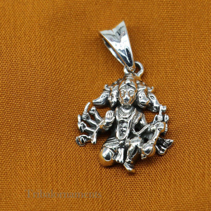Sterling silver Panchmukhi Hanuman pendant by TRIBAL ORNAMENTS, unisex Hindu jewelry with intricate handmade design.