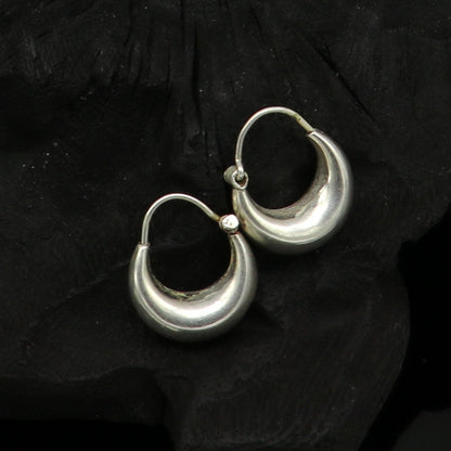 Sterling silver handmade hoop earrings with tribal vintage design, featuring hook ear wires for daily or special occasion wear.
