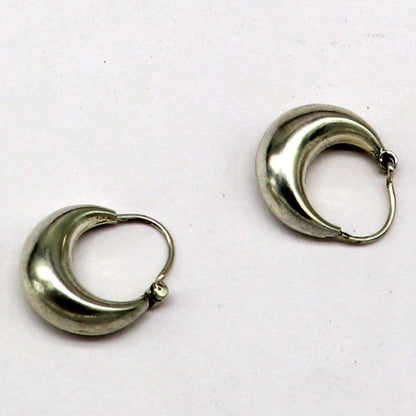 Sterling silver handmade hoop kundal earrings by TRIBAL ORNAMENTS, featuring vintage tribal design and hook-style ear wires.