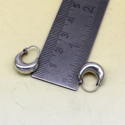 Sterling silver handmade hoop kundal earrings by TRIBAL ORNAMENTS, featuring tribal vintage design and hook-style ear wires.