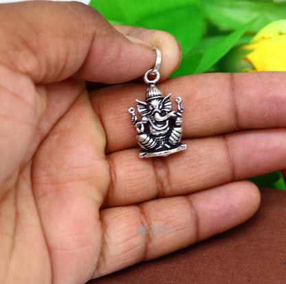 Sterling silver Lord Ganesha pendant by TRIBAL ORNAMENTS, unisex handmade jewelry with intricate tribal design and personalized style.