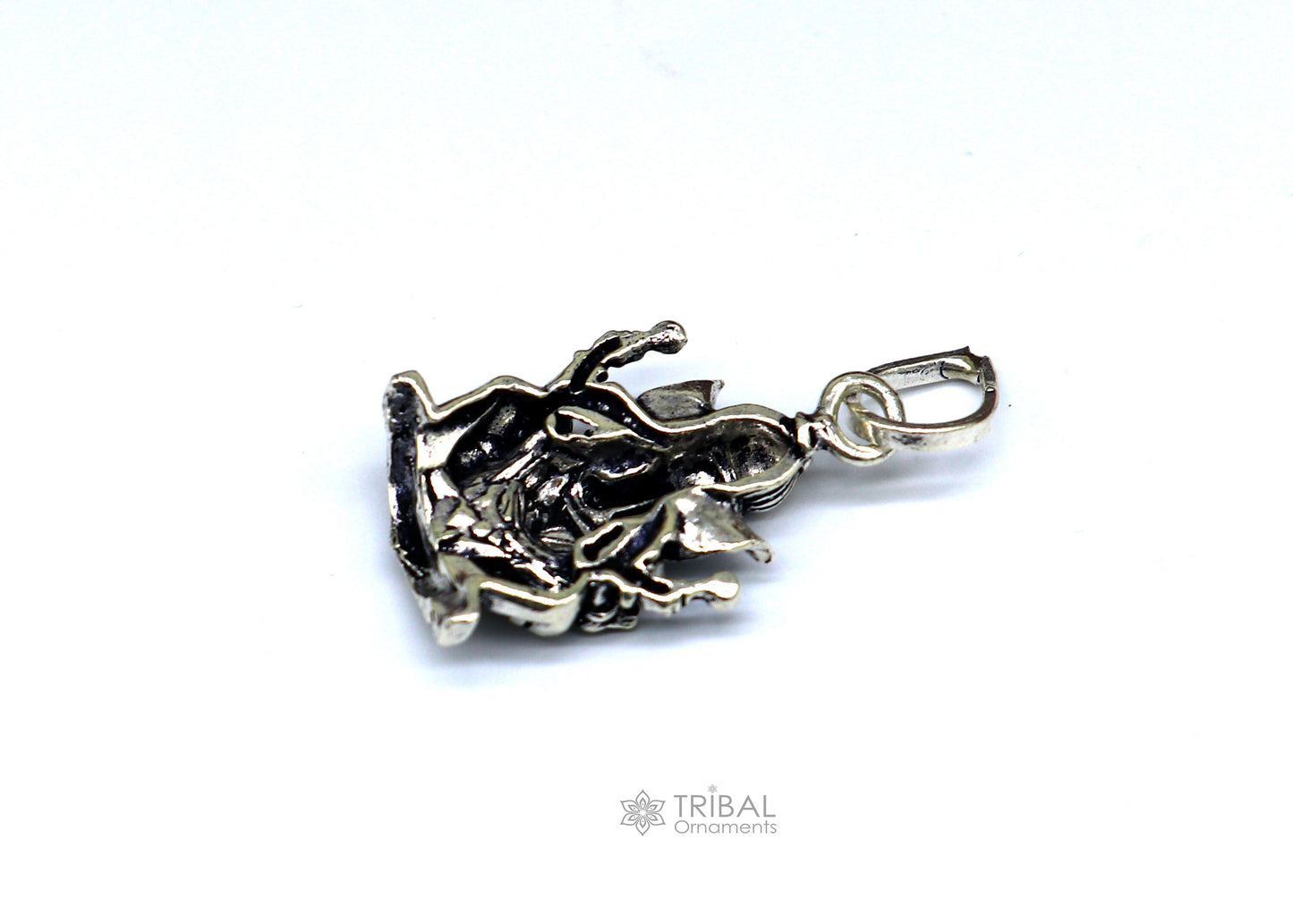 Sterling silver Lord Ganesha pendant by TRIBAL ORNAMENTS, unisex handmade jewelry with detailed tribal design and personalized style.