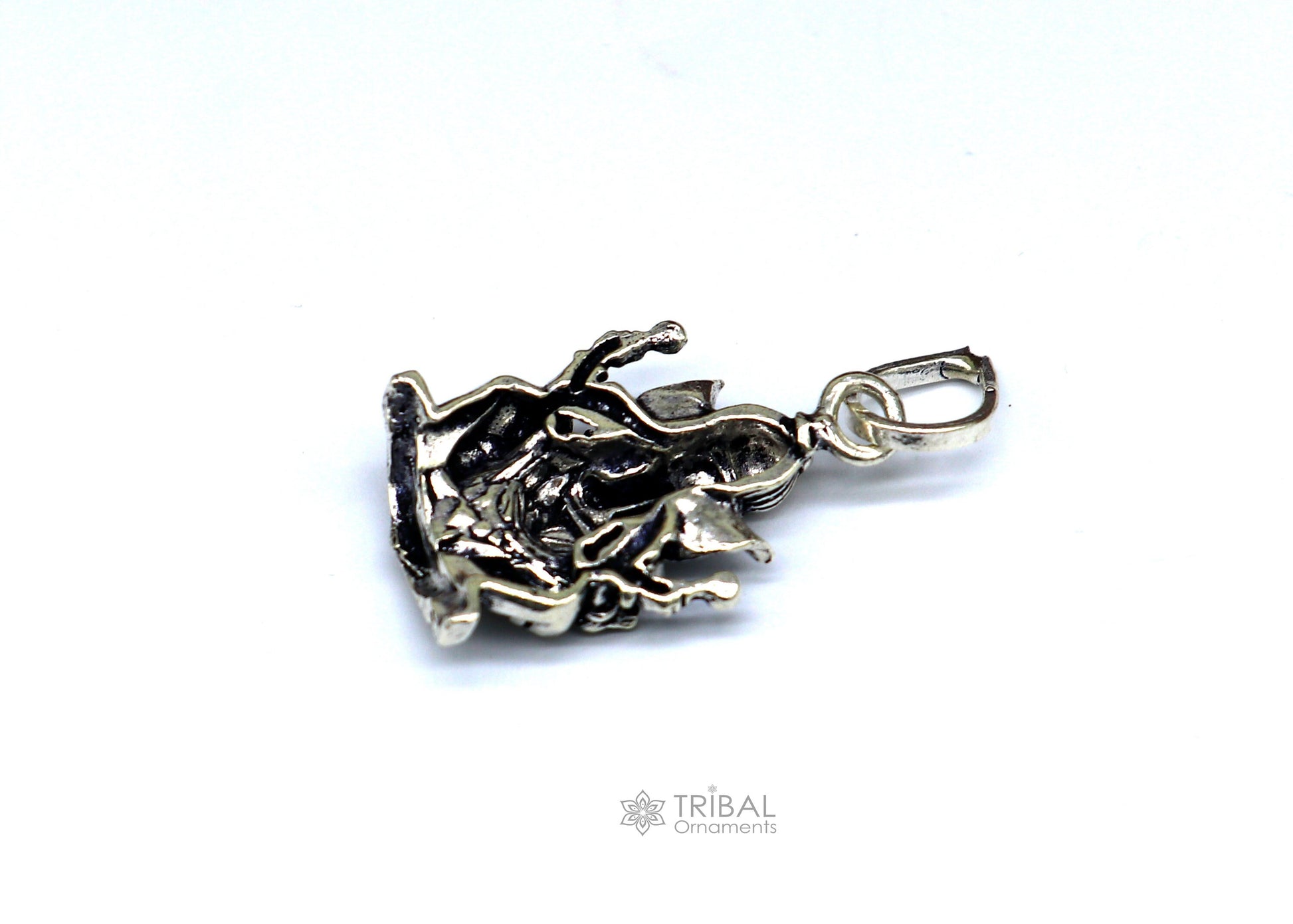 Sterling silver Lord Ganesha pendant by TRIBAL ORNAMENTS, unisex handmade jewelry with detailed tribal design and personalized style.