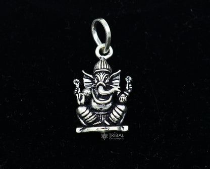 Sterling silver Lord Ganesha pendant by Tribal Ornaments, handmade unisex jewelry with intricate tribal design.