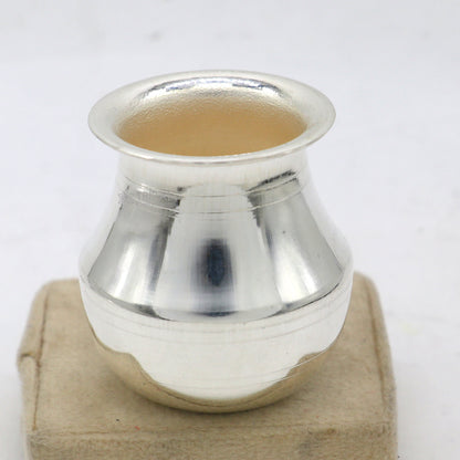 Small handmade pure 925 sterling silver Kalash pot for puja, featuring a plain design, ideal for water or milk offerings in India.