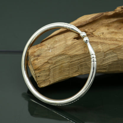 Sterling silver baby bangle bracelet with plain shiny design, adjustable and suitable for newborns by TRIBAL ORNAMENTS.