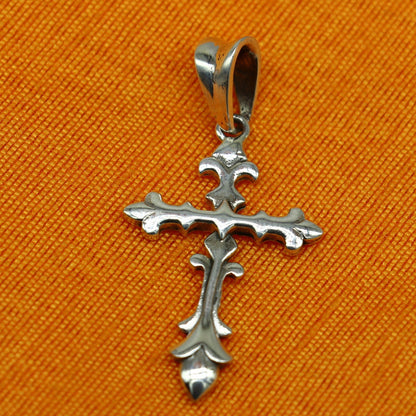 Sterling silver cross pendant by Tribal Ornaments, vintage and stylish unisex jewelry with intricate design and antique finish.