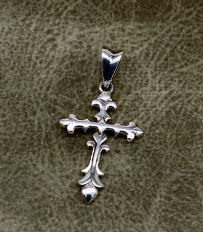 Sterling silver stylish cross pendant by TRIBAL ORNAMENTS, vintage unisex jewelry with intricate design and antique finish.