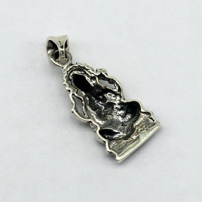 Sterling silver Ganesha pendant featuring intricate tribal design, perfect for gifting or stylish Hindu jewelry collection.