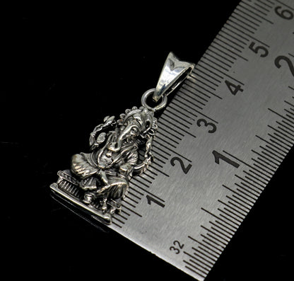 Sterling silver Ganesha pendant featuring intricate Hindu goddess design, perfect for jewelry and gifting.