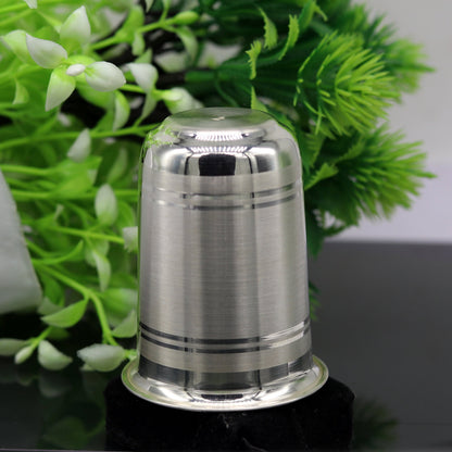 Pure 999 fine silver water and milk glass tumbler, silver flask, and baby silver utensils from Tribal Ornaments.