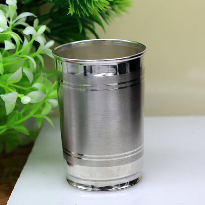 Pure 999 fine silver handmade water and milk glass tumbler, silver flask, and baby silver utensils by TRIBAL ORNAMENTS.