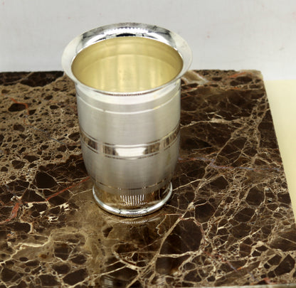 Pure 999 fine silver handmade tumbler and flask, silver water and milk glasses, and baby silver utensils by TRIBAL ORNAMENTS.