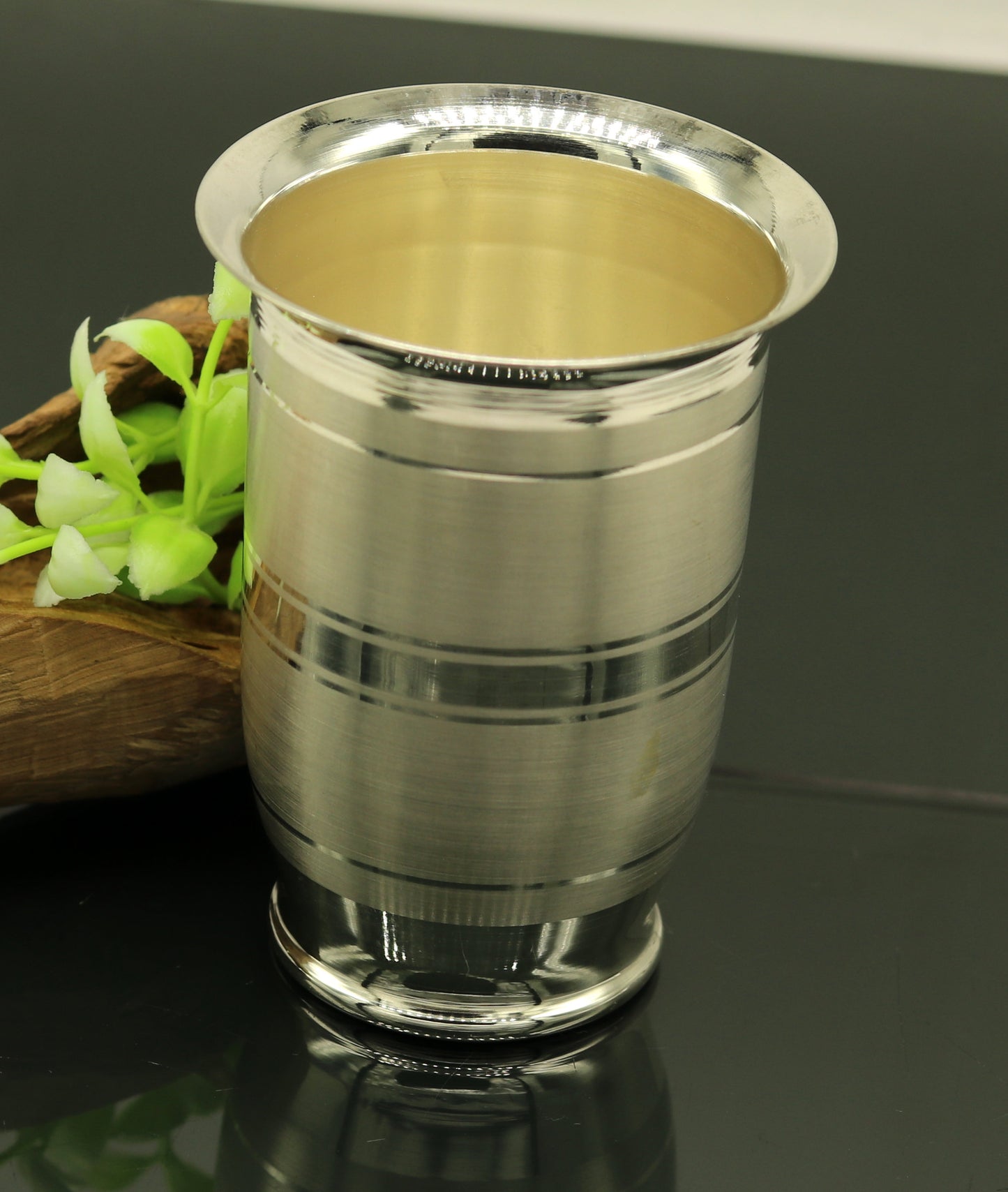 Handmade pure 999 silver water and milk glass tumbler, silver flask, and baby silver utensils from Tribal Ornaments.