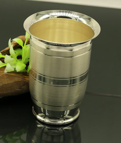 Handmade pure 999 silver water and milk glass tumbler, silver flask, and baby silver utensils from Tribal Ornaments.