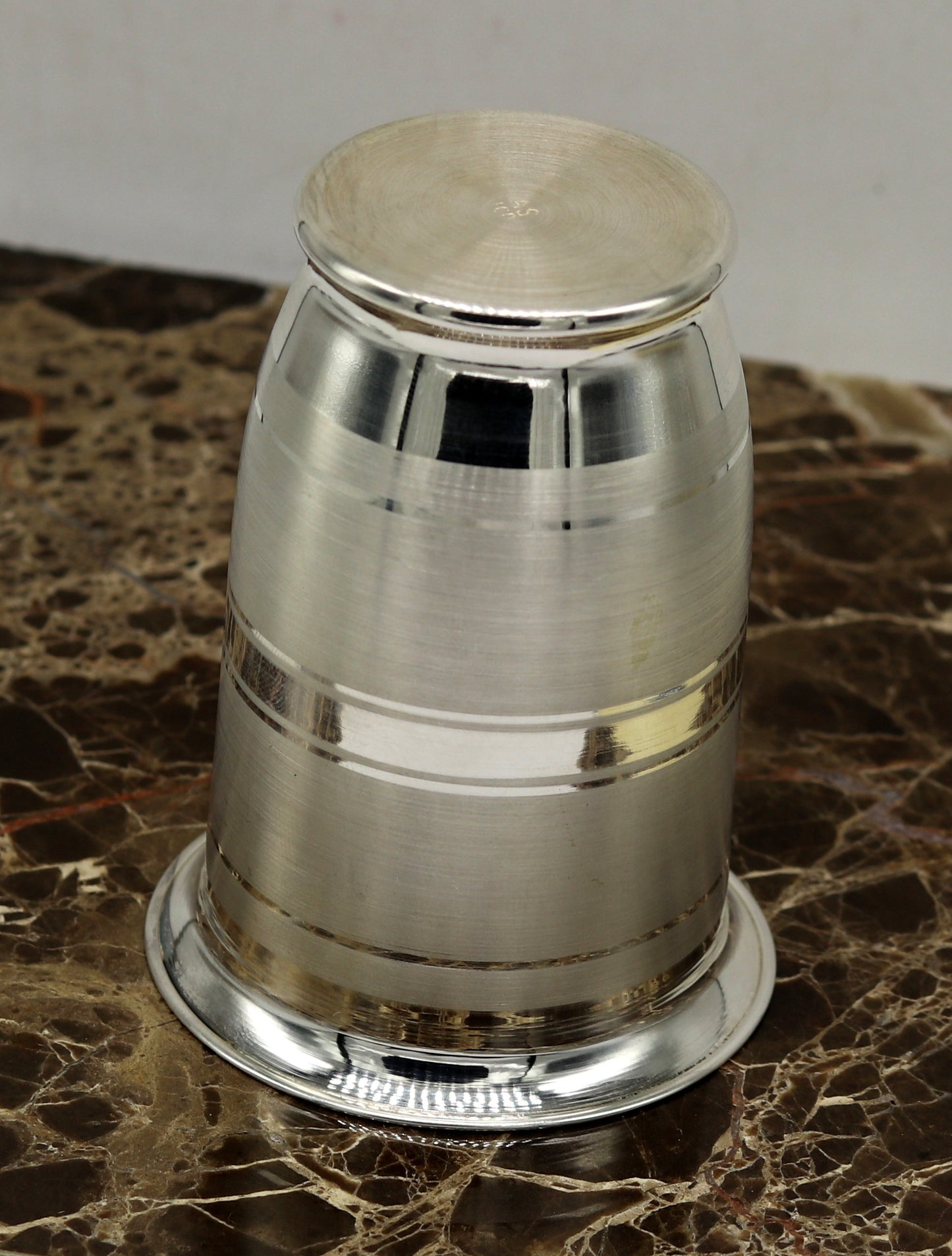 Handmade pure 999 fine silver water and milk glass tumbler, silver flask, and baby silver utensils by TRIBAL ORNAMENTS.
