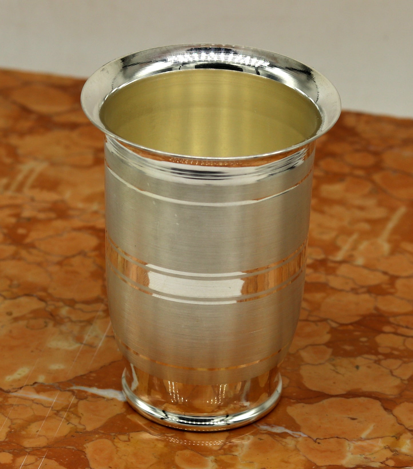 Pure 999 fine silver handmade water and milk glass tumbler, silver flask, and baby silver utensils by TRIBAL ORNAMENTS.