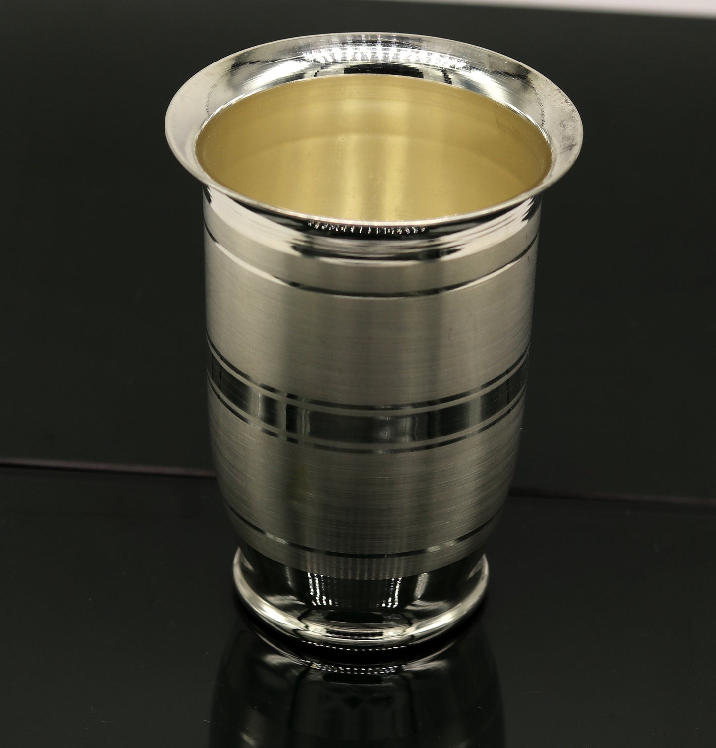 Pure 999 fine silver handmade water and milk tumbler, silver flask, and baby silver utensils by TRIBAL ORNAMENTS.